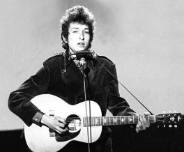bob-dylan-play-guitar-harmonica